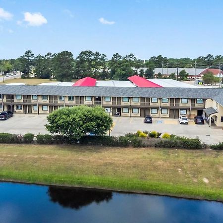 Executive Inn & Suites Magnolia Bagian luar foto