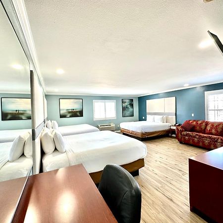 Executive Inn & Suites Magnolia Bagian luar foto