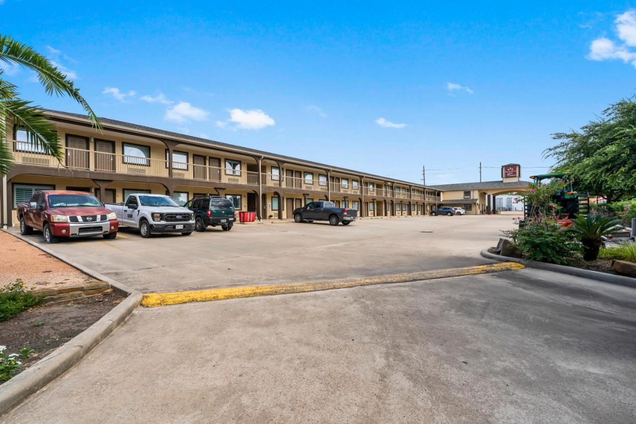 Executive Inn & Suites Magnolia Bagian luar foto