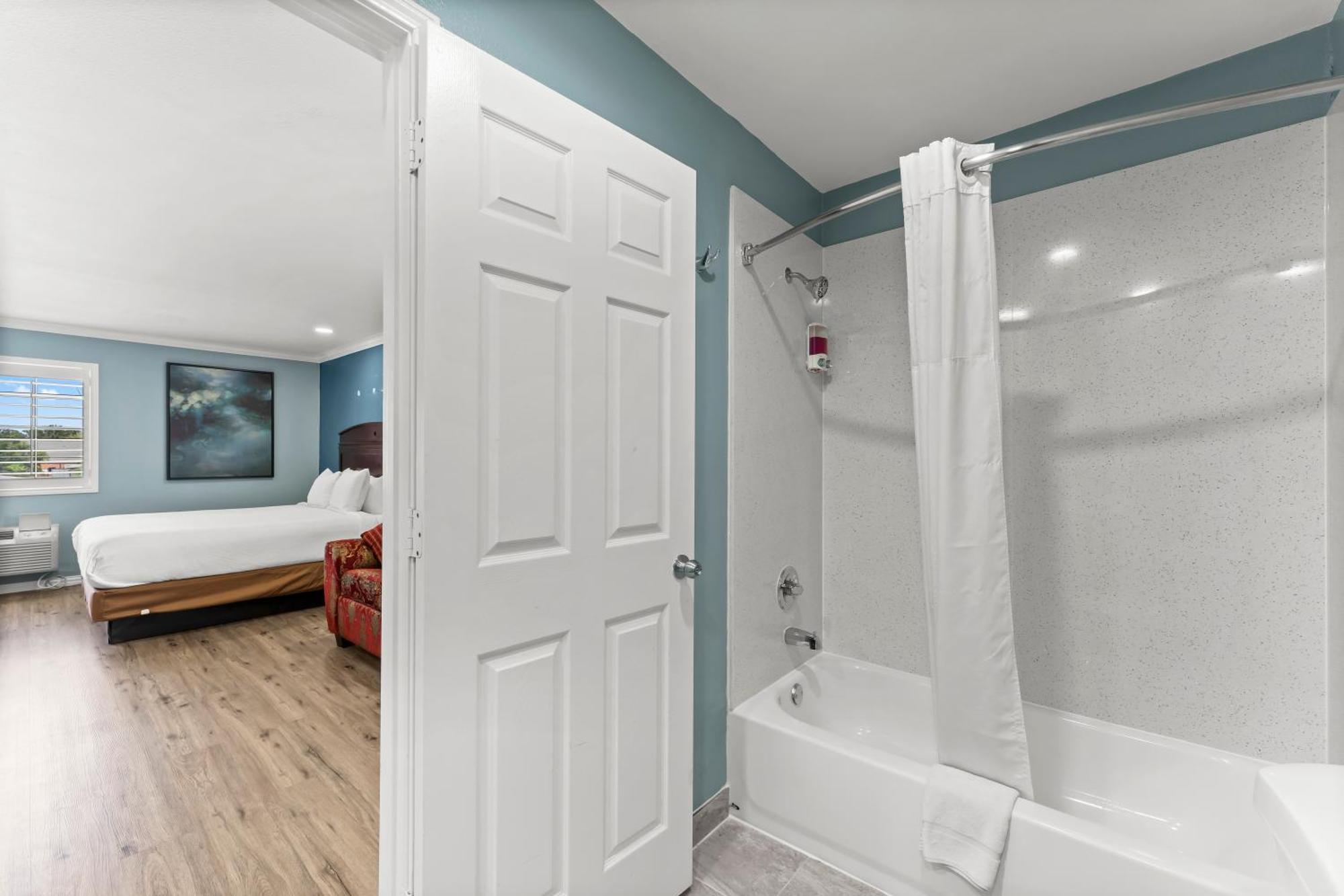 Executive Inn & Suites Magnolia Bagian luar foto
