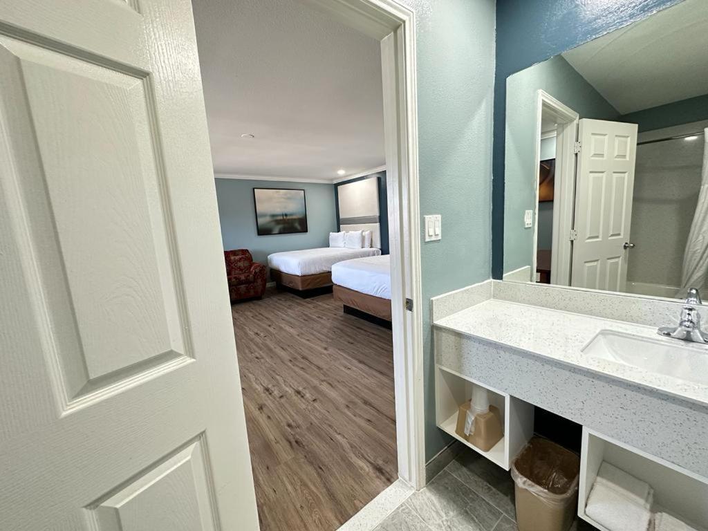 Executive Inn & Suites Magnolia Bagian luar foto