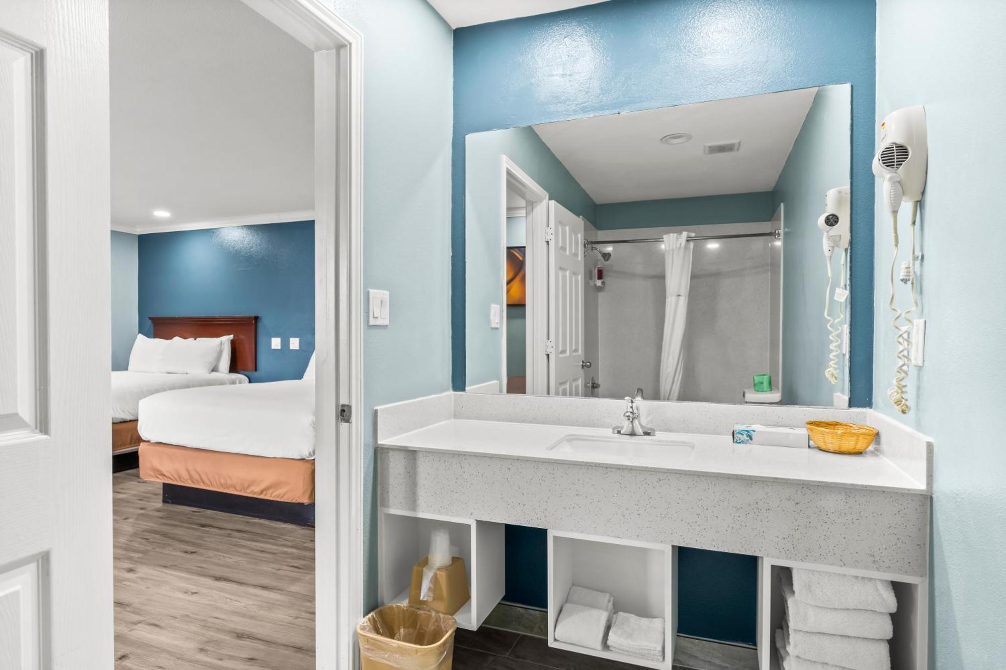 Executive Inn & Suites Magnolia Bagian luar foto