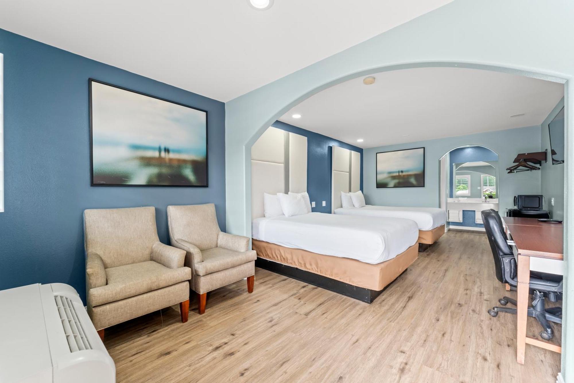 Executive Inn & Suites Magnolia Bagian luar foto