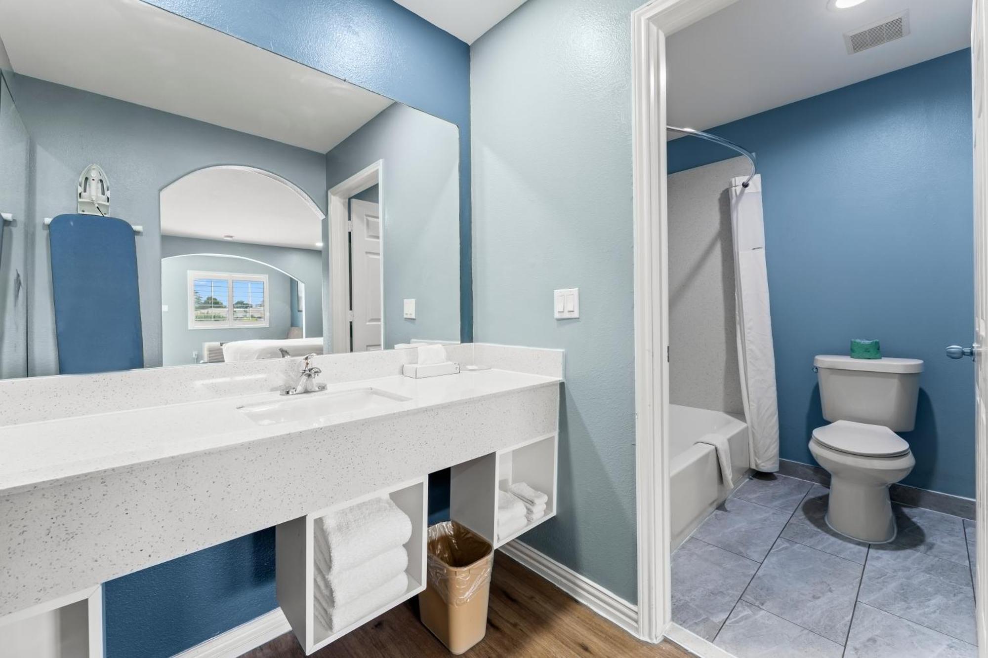 Executive Inn & Suites Magnolia Bagian luar foto