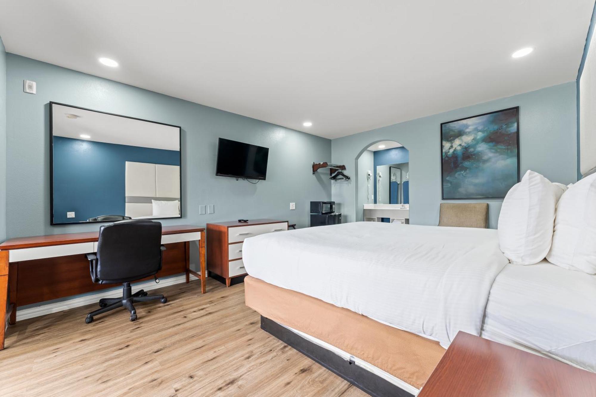 Executive Inn & Suites Magnolia Bagian luar foto