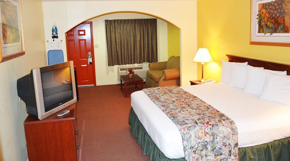 Executive Inn & Suites Magnolia Bagian luar foto