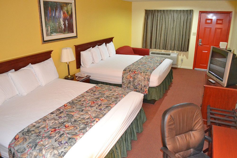 Executive Inn & Suites Magnolia Bagian luar foto