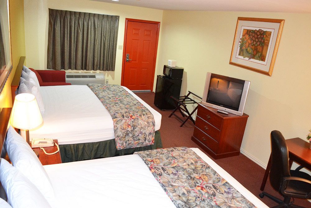 Executive Inn & Suites Magnolia Bagian luar foto