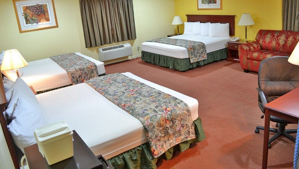 Executive Inn & Suites Magnolia Bagian luar foto