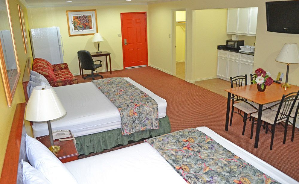 Executive Inn & Suites Magnolia Bagian luar foto